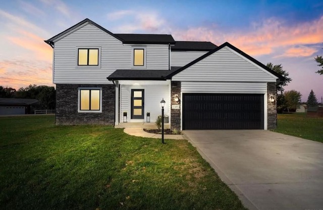 Like new 4 bedroom 2.5 bath home with boat slip on Lake Wawasee, IN. Sleeps 11+