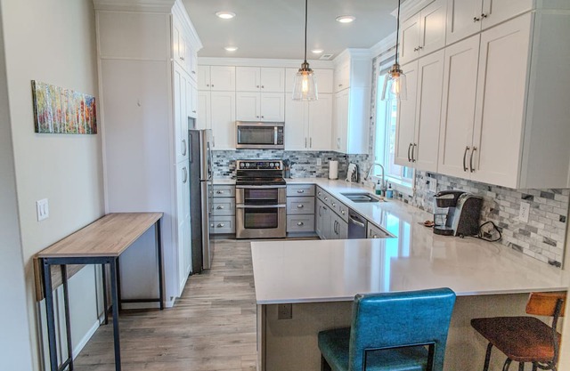 Modern 1 Bedroom Attached Apartment with separate driveway and entrance.