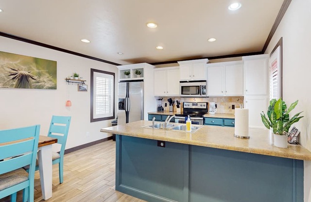 1940s home with modern updates, open layout, & smart TVs - great location