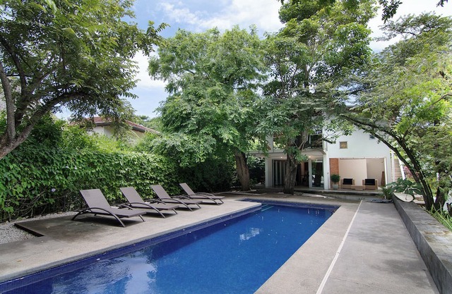 Pool-Side Apartment with Jungle Views and Beach Access