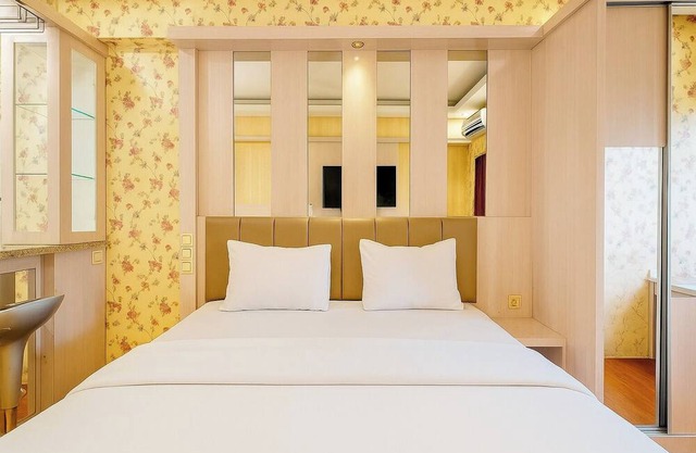 Quintessa Room at Candiland Apartement