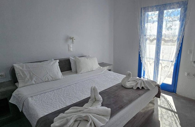 Classic Quadruple Room 3 with Balcony and Air Conditioning