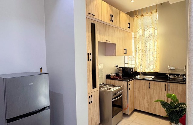 Charming 1-bedroom apartment with Unlimited WiFi, Parking Space, AC in Kisaasi