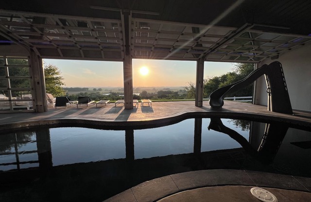 Family-Friendly Nebraska Estate with Scenic Pool, Gym, Theater & Fire Pit Fun