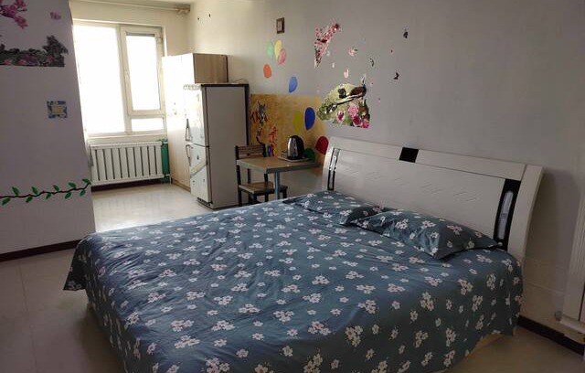 Daqing Apartment | 唐人中心日租房