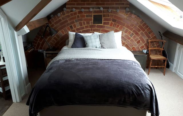 Devizes House | A loft room with ensuite