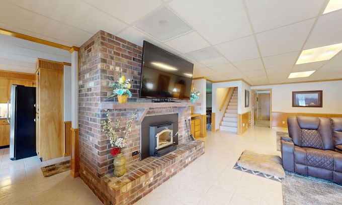 Post Falls House | Beautiful riverfront home with private dock, patio, pool table, WiFi, and W/D