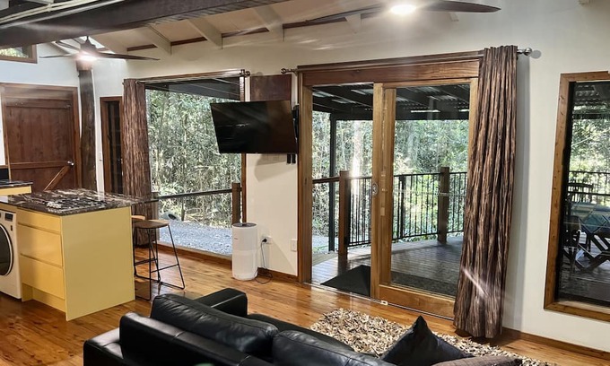 Malanda Cabin | Figtree Getaway Tree house Spa cabin king bedroom plus loft 2 bedroom