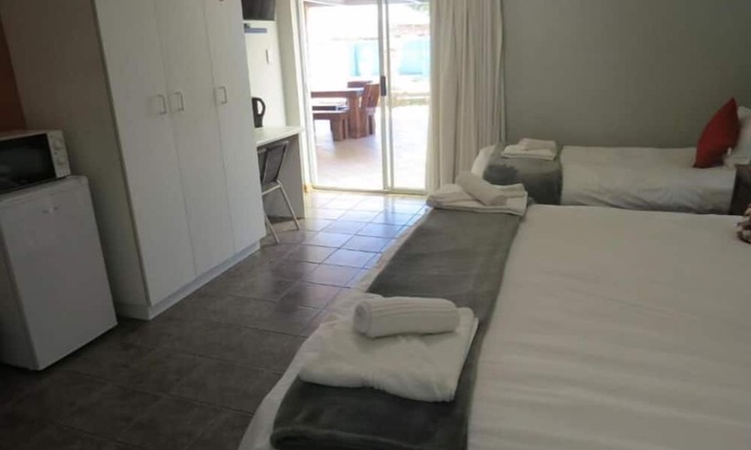 Fichardt Park Apartment | Orchard Guesthouse Double Room with Pool View