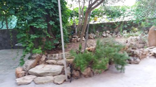 Torre del Pozzo Apartment | Relax in giardino